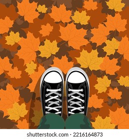 Autumn poster for your design. Someone in gumshoes standing on autumn leaves. October wether. Life style, fashion,hipster