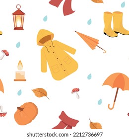 Autumn rainy seamless pattern with umbrella, yellow shoes,  coat and pumpkin