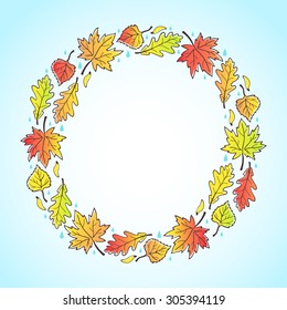 Autumn round decorative frame with space for text. Circle made of leaves, maple seeds and raindrops. Fall background.