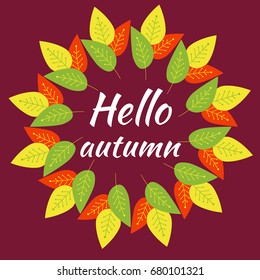Autumn round frame from red, yellow, green decorative leaves on burgundy background. Hello autumn. Vector