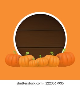 autumn round wooden sign with vector orange pumpkins isolated on orange background. Creative Design template for farm market banners and thanksgiving day backgrounds with pumpkins frame or border