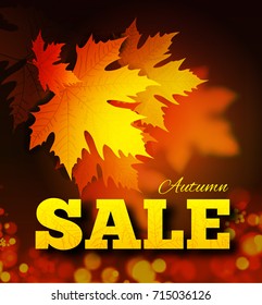Autumn sale background with leaf texture on the lettersh and bokeh.