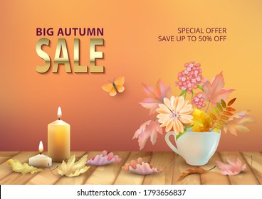 Autumn Sale Design. Autumn background with floral bouquet in teacup, burning candles and fallen leaves