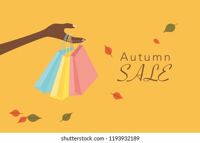 Autumn sale illustration with hand and shopping bag