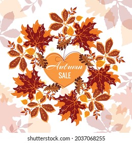 Autumn sale offer in a heart decorated with bright leaves