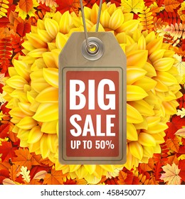 Autumn sale tag on colorful leaves and sunflower background. EPS 10 vector file included