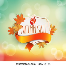 Autumn sale. Vintage frame with  text and ribbon with autumn leaves on a beautiful natural background Abstract vector illustration .