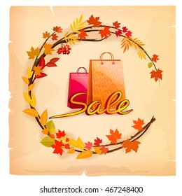 Autumn sales background with the wreath of leaves in vintage style.