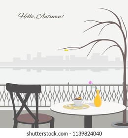 Autumn scene with cafe table on the embankment. Vector illustration.
