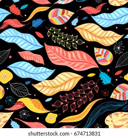 Autumn seamless color pattern from different leaves on a dark background