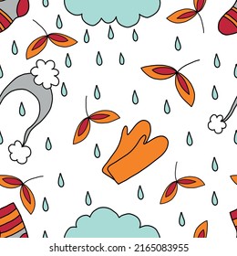 autumn seamless endless doodle-style pattern on a white background. clothes and leaves .