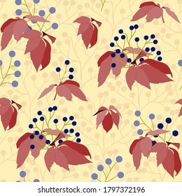 Autumn seamless pattern with berries and leaves on a yellow background. Bright vector texture in red, brown and yellow colors for fabric, home textiles and paper.