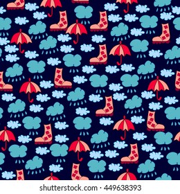 Autumn seamless pattern with clouds, raindrops, boots and umbrellas on dark blue background.