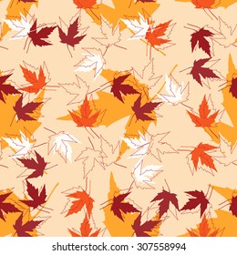 Autumn seamless pattern with colorful maple leaves.