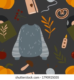 Autumn seamless pattern. Cozy illustration for cards, posters, wrapping paper, scrapbooking, fabric, clothes and other fall design. Hygge home elements, fall essentials: leaves, pumpkin, sweater, etc.