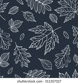 Autumn seamless pattern. Fall of the leaves. Autumn leaves are drawn with chalk on black chalkboard. Wrapping paper, cloth. Vector illustration.