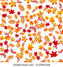 Autumn seamless pattern with fallen leaves. Color autumn background. Red, yellow, orange maple, rowan, chestnut leaves. Vector background for banners, wallpaper, packing, wrapping.