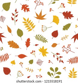 Autumn seamless pattern with fallen tree leaves and sprigs with berries on white background. Colorful natural autumnal vector illustration in flat style for wrapping paper, backdrop, textile print.