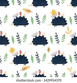 Autumn seamless pattern with hedgehogs and leaves, berries.
Vector design for wrapping paper, textile. 