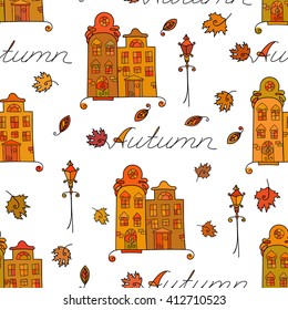 Autumn seamless pattern of houses with varicolored windows, streetlights and falling leaves. Design element for background, textile, paper packaging, wrapping paper and other. Vector illustration. 