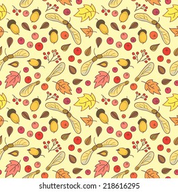 Autumn seamless pattern with leaves, acorns, berries and maple seed pods.