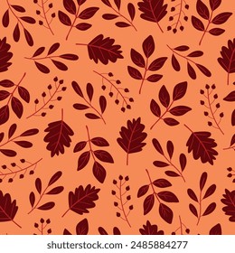 Autumn seamless pattern with autumn leaves on a peach background. Autumn background.