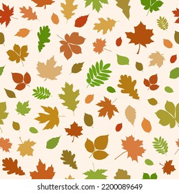 Autumn seamless pattern made up of many maple, chestnut, oak, birch and other leaves for printing on wrapper, package, cloth, textile or cards. Endless repeating texture for autumn holidays.