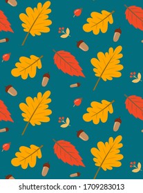 Autumn seamless pattern on a dark blue background with red and yellow oak leaves, acorns, rose hips to create a background