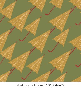 Herbstnahtloses Muster mit orangefarbenen Regenschirmen auf grünem Hintergrund. Pastellfarben fallen Palette. Dekorativer Hintergrund für Stoffdesign, Stoffdruck, Umhüllung, Abdeckung. Vektorgrafik.