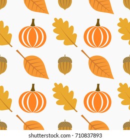 Autumn seamless pattern, pumpkin, leaves and acorns. Vector illustration
