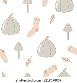 Patrón ininterrumpido de otoño con calabaza, champiñón, hojas, calcetín de punto caliente sobre fondo de luz para tela infantil, textil, vivero, papel pintado