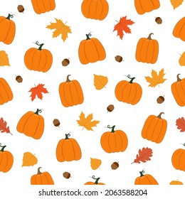 Autumn seamless pattern. Pumpkins, leaves, acorns on white background. Background for autumn decorative design