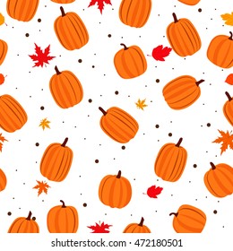 Autumn seamless pattern with pumpkins and maple leaves