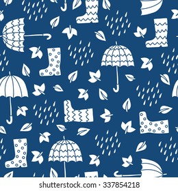autumn seamless pattern with rainy boots, umbrella, leaves and rain drops