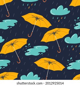 Autumn seamless pattern with rainy weather elements - umbrella, clouds and puddle. Vector illustration.