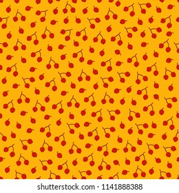 Autumn seamless pattern with red berries on yellow background. Perfect for seasonal and Thanksgiving Day greeting cards 