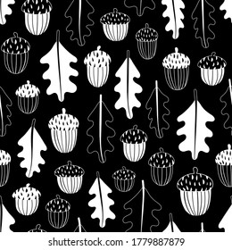 Autumn seamless pattern with stylized oak leaves and acorns. Scandinavian style texture for fabric, wrapping, textile, wallpaper, clothes. Black and white vector background with natural motifs.