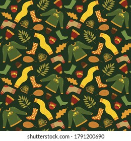 Autumn seamless pattern. Sweater, scarf, socks, boots, mug. Cozy background for web design, printing on fabric and paper. Isolated vector illustration.