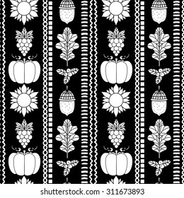 Autumn seamless pattern. Thanksgiving Day repeatable border background. Pumpkin, acorn, oak leaves, bunch grapes, berries, sunflower