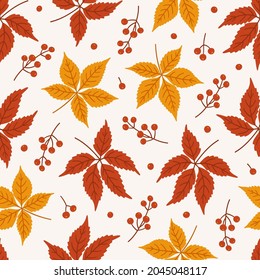 Autumn seamless pattern with virginia creeper leaves and berries. Vector illustration on white background. Fall ornament. Foliage print for fabric, package, wrapping, wall art. Red, orange colors.