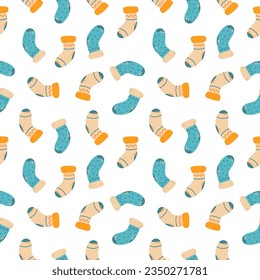 Autumn seamless pattern with warm socks