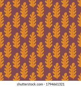 Autumn seamless pattern with yellow oak leaves on brown background. Perfect for gift paper, wallpaper, seasonal holidays, greeting cards. Vector illustration
