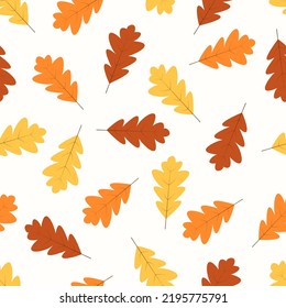 Autumn seamless pattern, yellow and red oak leaves and acorns fall in autumn