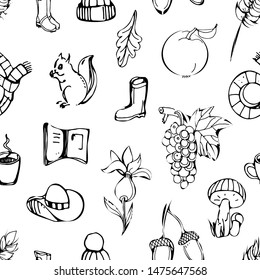 Autumn seamless pattern.Autumn doodle line hand drawn background with different symbols related to fall.Hand drawn elements for fabrics, wallpaper on the white background.