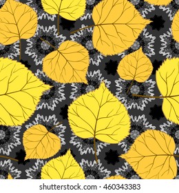 Autumn seamless pattern.Bright yellow leaves on black-and-white patterned background.Vector illustration.Design for web pages,cloth,textile,wrapping paper,scrapbooking,Wallpapers.