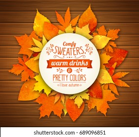 Autumn season banner. Greeting card with text and hand drawn watercolor fall leaves. Modern lettering and watercolor colorful foliage of yellow, orange and red color on wooden background