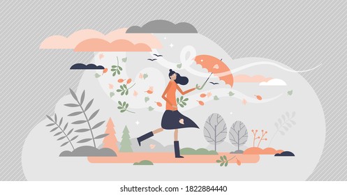 Autumn season and leaves fall   windy weather walk tiny persons concept  Outdoor environment scene and seasonal forecast   fashion girl and umbrella vector illustration  Symbolic storm   rain