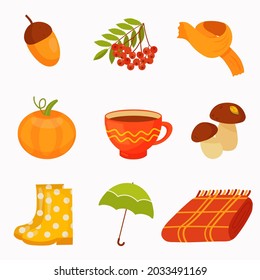 Autumn set of elements in a flat style. Acorn, mountain ash, scarf, pumpkin, cup, mushrooms, yellow rubber boots, green umbrella, red blanket on a white background