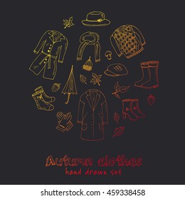Autumn set. Set with oak leaves, shoes, clothing and umbrellas. Vector