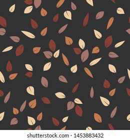 Autumn stylized leaf on dark grey background. Seamless decorative autumn pattern.